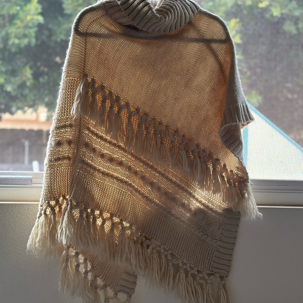 Chic Beige Knit Poncho with Fringe
